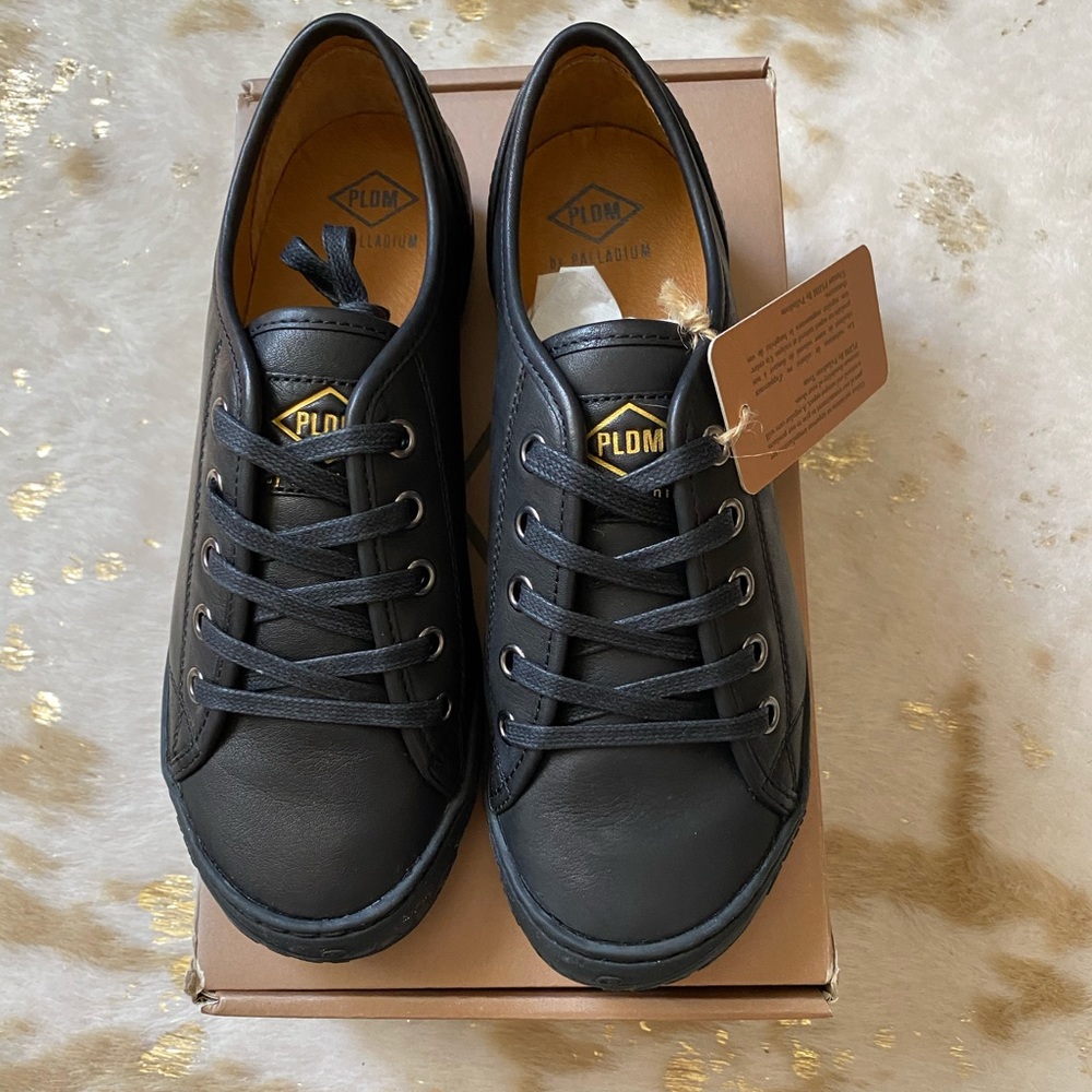 Black leather lace up athlesure shoes by Palladium